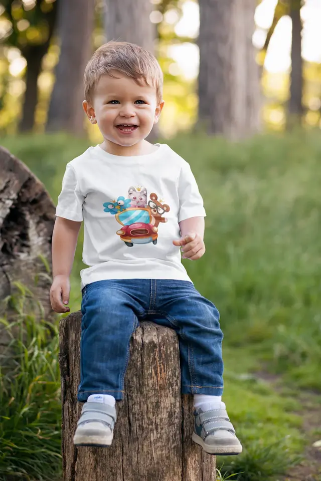 Toddler wearing a printed kids T-shirt outdoors